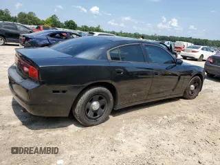 2013 Dodge Charger Police with VIN 2C3CDXAT6DH586213, listed as a Copart auction lot 62193175 with 197,497 mi miles and Clean title. Bid and sale history available at DreamBid. Image 3.