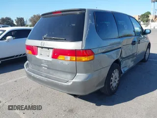 2002 Honda Odyssey LX z VIN 2HKRL18542H553437, wystawiony jako IAAI lot #41824481 z przebiegiem 222 428 mil mil oraz . Historia ofert i sprzedaży dostępna na DreamBid. Obrazek 4.
