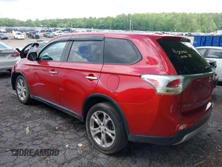 2015 Mitsubishi Outlander SE with VIN JA4AD3A35FZ005812, listed as a IAAI auction lot 42302752 with 165,483 mi miles and . Bid and sale history available at DreamBid. Image 3.