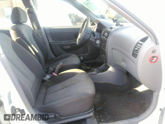 2004 Hyundai Accent GL with VIN KMHCG45C04U498939, listed as a IAAI auction lot 41384821 with 247,994 mi miles. Bid and sale history available at carsss.com. Image 5.