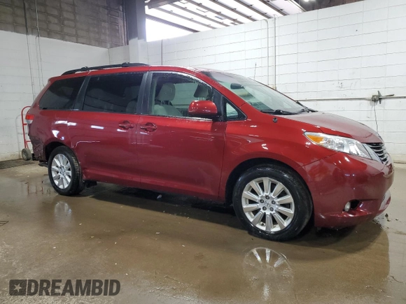 2014 Toyota Sienna LE with VIN 5TDJK3DC9ES083307, listed as a Copart auction lot 57939385 with 132,494 mi miles and Salvage title. Bid and sale history available at DreamBid. Image 4.