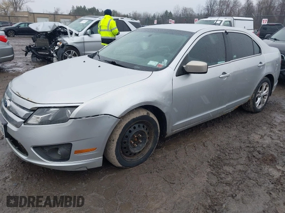 2012 Ford Fusion SE with VIN 3FAHP0HA9CR164546, listed as a IAAI auction lot 42016566 with 185,251 mi miles. Bid and sale history available at carsss.com. Image 2.