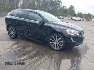 2016 Volvo XC60 T5 Drive-E Premier with VIN YV440MDK0G2857046, listed as a IAAI auction lot 41752649 with 36,896 mi miles. Bid and sale history available at carsss.com. Image 1.
