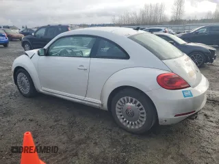 2014 Volkswagen Beetle 1.8T z VIN 3VWJ17AT1EM663680, wystawiony jako Copart lot #48163255 z przebiegiem 67 809 mil mil oraz Szkoda całkowita • Salvage title. Historia ofert i sprzedaży dostępna na DreamBid. Obrazek 2.
