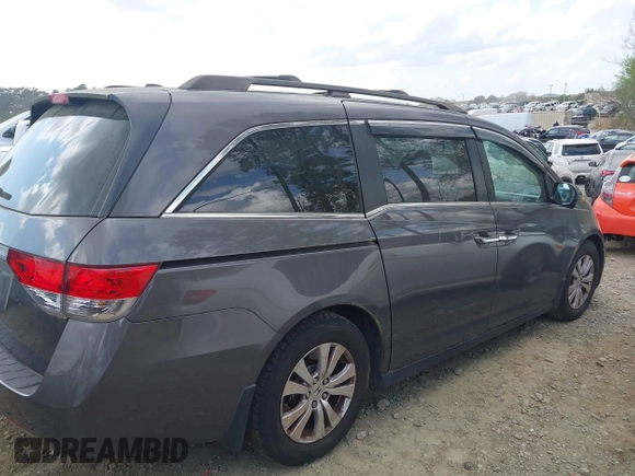 2016 Honda Odyssey EX-L with VIN 5FNRL5H61GB128957, listed as a IAAI auction lot 41953181 with 136,386 mi miles and . Bid and sale history available at DreamBid. Image 13.