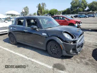 2021 MINI Hardtop 4 Door Cooper S с VIN WMWXU9C06M2N01629, выставлен на аукционе Copart как лот 65398605 с пробегом 74 356 миль миль и Списание • Salvage title. История ставок и продаж доступна на DreamBid. Изображение 4.
