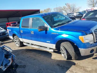 2011 Ford F-150 XLT with VIN 1FTFW1ET1BFC56942, listed as a IAAI auction lot 40717244 with 122,981 mi miles. Bid and sale history available at carsss.com. Image 13.