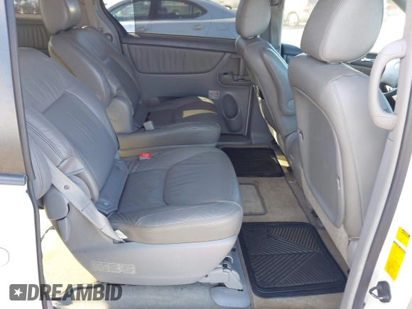 2010 Toyota Sienna XLE with VIN 5TDYK4CC3AS336590, listed as a IAAI auction lot 41798194 with 230,707 mi miles. Bid and sale history available at carsss.com. Image 8.