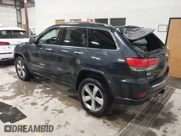 2014 Jeep Grand Cherokee Overland with VIN 1C4RJFCT9EC234270, listed as a IAAI auction lot 41938621 with 144,541 mi miles and . Bid and sale history available at DreamBid. Image 3.