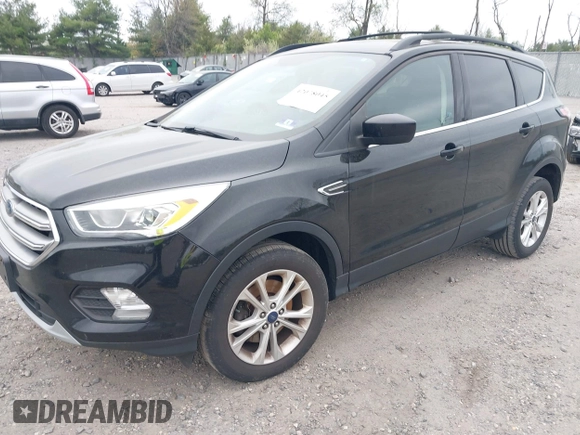 2017 Ford Escape SE with VIN 1FMCU9GD0HUC58128, listed as a IAAI auction lot 42078045 with 125,503 mi miles. Bid and sale history available at carsss.com. Image 17.