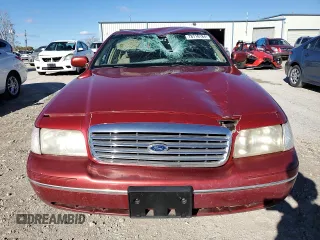 1998 Ford Crown Victoria LX с VIN 2FAFP74W4WX118422, выставлен на аукционе Copart как лот 78716184 с пробегом 70 214 миль миль и Списание • Salvage title. История ставок и продаж доступна на DreamBid. Изображение 5.