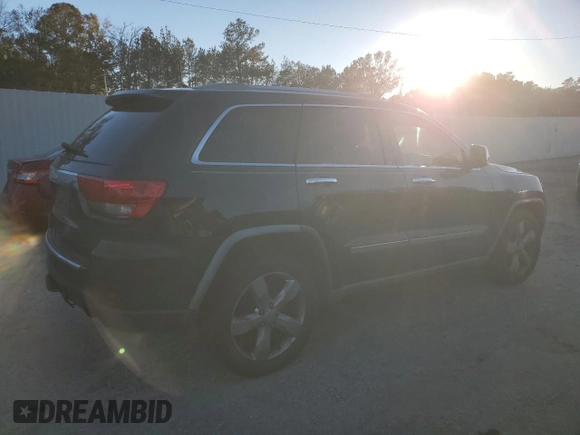 2011 Jeep Grand Cherokee Overland with VIN 1J4RS6GG0BC557302, listed as a Copart auction lot 83851734 with 195,443 mi miles and Salvage Title. Bid and sale history available at DreamBid. Image 3.