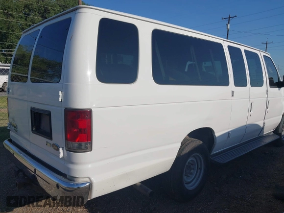 2014 Ford Econoline Wagon XL with VIN 1FBSS3BLXEDA86613, listed as a IAAI auction lot 41996263 with 238,848 mi miles. Bid and sale history available at carsss.com. Image 4.