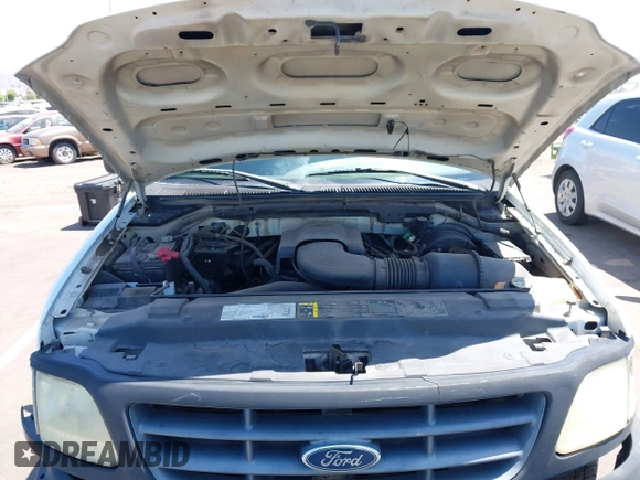 2003 Ford F-150 XL with VIN 2FTRF17W73CA77144, listed as a IAAI auction lot 42609120 with 102,490 mi miles and . Bid and sale history available at DreamBid. Image 10.