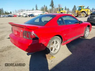 1996 Ford Mustang with VIN 1FALP4042TF180575, listed as a IAAI auction lot 41561882 with 248,183 mi miles. Bid and sale history available at carsss.com. Image 4.