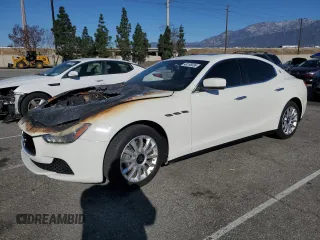 2014 Maserati Ghibli z VIN ZAM57XSA5E1097533, wystawiony jako Copart lot #48198035 z przebiegiem Nie podano mil oraz Szkody całkowita. Historia ofert i sprzedaży dostępna na DreamBid. Obrazek 1.