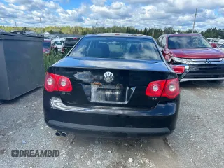 2006 Volkswagen Jetta z VIN 3VWRF31K56M604489, wystawiony jako Copart lot #61240034 z przebiegiem 136 199 mil mil oraz Szkoda całkowita • Salvage title. Historia ofert i sprzedaży dostępna na DreamBid. Obrazek 6.