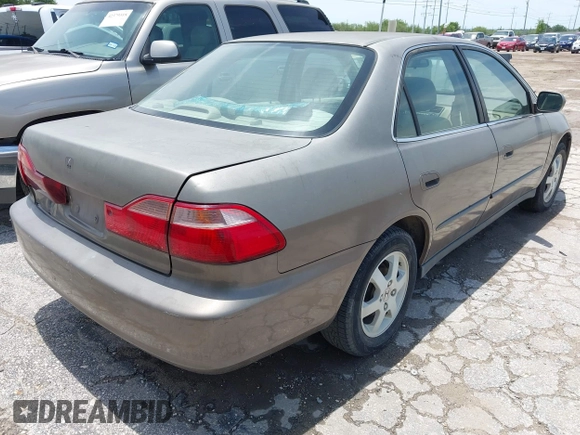 2000 Honda Accord SE z VIN 1HGCG5673YA090469, wystawiony jako IAAI lot #42391254 z przebiegiem 140 819 mil mil oraz . Historia ofert i sprzedaży dostępna na DreamBid. Obrazek 4.