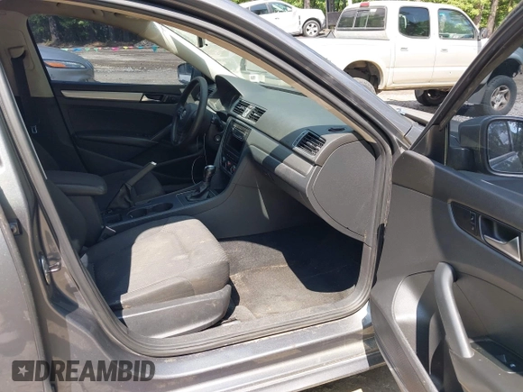 2014 Volkswagen Passat S with VIN 1VWAP7A37EC018693, listed as a IAAI auction lot 42463719 with 143,105 mi miles and . Bid and sale history available at DreamBid. Image 5.