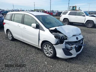2013 Mazda 5 Sport with VIN JM1CW2BL6D0145919, listed as a IAAI auction lot 42010804 with 96,568 mi miles. Bid and sale history available at carsss.com. Image 1.