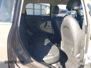 2014 MINI Countryman S with VIN WMWZC3C5XEWP52054, listed as a IAAI auction lot 41452354 with 104,873 mi miles and . Bid and sale history available at DreamBid. Image 8.