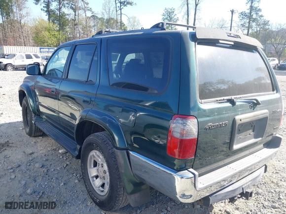 2000 Toyota 4Runner SR5 with VIN JT3HN86R6Y0305155, listed as a IAAI auction lot 41890566 with 223,502 mi miles. Bid and sale history available at carsss.com. Image 3.