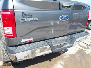 2015 Ford F-150 XLT w/HD Payload Pkg with VIN 1FTFW1EF7FKD04869, listed as a IAAI auction lot 41664736 with 165,784 mi miles. Bid and sale history available at carsss.com. Image 6.