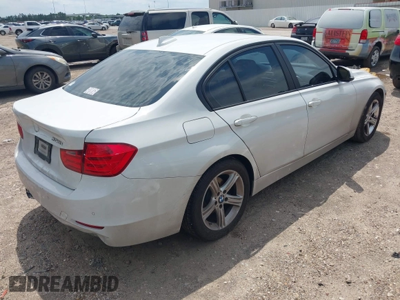 2013 BMW 3 Series 328i with VIN WBA3A5C5XDJ461783, listed as a IAAI auction lot 42150355 with 115,992 mi miles and . Bid and sale history available at DreamBid. Image 4.