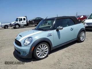 2013 MINI Convertible S z VIN WMWZP3C54DT551321, wystawiony jako Copart lot #57089205 z przebiegiem 92 441 mil mil oraz Szkoda całkowita • Salvage title. Historia ofert i sprzedaży dostępna na DreamBid. Obrazek 1.