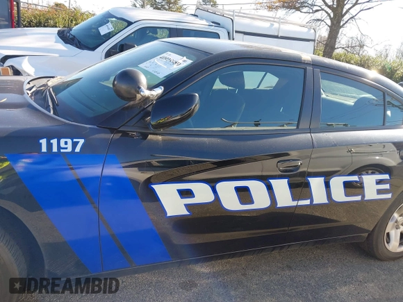2022 Dodge Charger Police with VIN 2C3CDXAT3NH109952, listed as a IAAI auction lot 40919989 with 19,169 mi miles and . Bid and sale history available at DreamBid. Image 14.