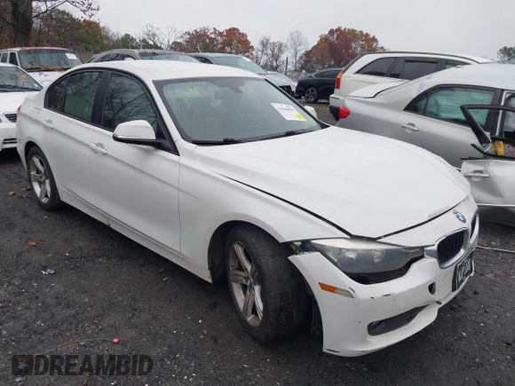 2015 BMW 3 Series 320i with VIN WBA3B1C51FP831380, listed as a IAAI auction lot 41044053 with 187,660 mi miles. Bid and sale history available at carsss.com. Image 1.