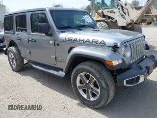 2018 Jeep Wrangler Unlimited Sahara z VIN 1C4HJXEG4JW141540, wystawiony jako IAAI lot #42148402 z przebiegiem 43 909 mil mil oraz . Historia ofert i sprzedaży dostępna na DreamBid. Obrazek 1.