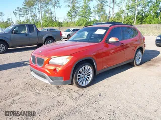 2013 BMW X1 28i with VIN WBAVM1C58DVW45105, listed as a IAAI auction lot 42049919 with 141,020 mi miles. Bid and sale history available at carsss.com. Image 2.