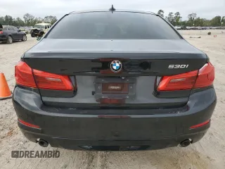 2018 BMW 5 Series 530i with VIN WBAJA5C54JG899845, listed as a Copart auction lot 83007584 with 57,379 mi miles and Salvage Title. Bid and sale history available at DreamBid. Image 6.