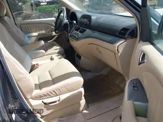 2005 Honda Odyssey EX-L with VIN 5FNRL38725B084980, listed as a IAAI auction lot 41917012 with 134,685 mi miles. Bid and sale history available at carsss.com. Image 5.