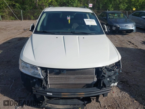 2017 Dodge Journey SXT z VIN 3C4PDCBG9HT589904, wystawiony jako IAAI lot #42084994 z przebiegiem 130 194 mil mil oraz . Historia ofert i sprzedaży dostępna na DreamBid. Obrazek 6.