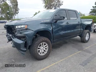 2020 Chevrolet Silverado 1500 RST with VIN 3GCPWDEDXLG277044, listed as a IAAI auction lot 42050251 with 59,708 mi miles and . Bid and sale history available at DreamBid. Image 2.