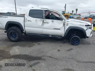 2023 Toyota Tacoma 4WD SR with VIN 3TMCZ5AN0PM550641, listed as a IAAI auction lot 41929355 with 18,917 mi miles. Bid and sale history available at carsss.com. Image 13.