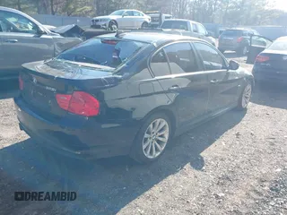 2011 BMW 3 Series 328i with VIN WBAPH5G50BNM83160, listed as a IAAI auction lot 41654019 with 111,596 mi miles. Bid and sale history available at carsss.com. Image 4.