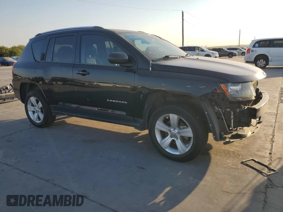 2015 Jeep Compass Latitude with VIN 1C4NJCEBXFD131484, listed as a Copart auction lot 74731464 with 76,048 mi miles and Salvage Title. Bid and sale history available at carsss.com. Image 4.