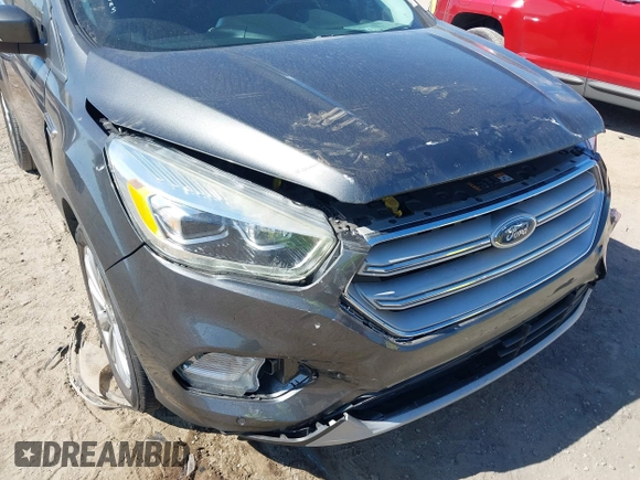 2018 Ford Escape Titanium with VIN 1FMCU0J99JUB09562, listed as a IAAI auction lot 41547659 with 63,700 mi miles and . Bid and sale history available at DreamBid. Image 6.