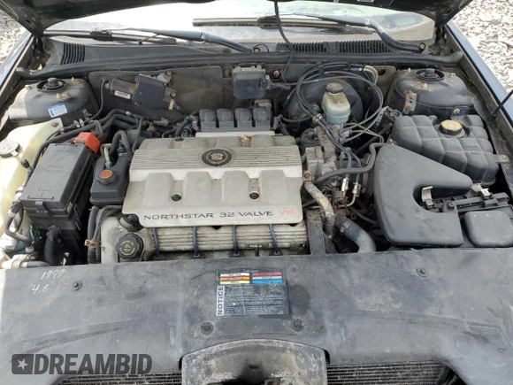 1999 Cadillac Seville z VIN N0V1N, wystawiony jako Copart lot #72249294 z przebiegiem Nie podano mil oraz Nie do naprawy • Non repairable. Historia ofert i sprzedaży dostępna na DreamBid. Obrazek 11.