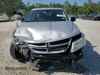 2013 Dodge Journey American Value with VIN 3C4PDCAB1DT715799, listed as a Copart auction lot 52404815 with 185,559 mi miles and Salvage Title. Bid and sale history available at DreamBid. Image 14.