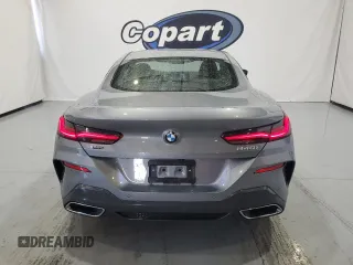 2025 BMW 8 Series 840i with VIN WBAAE4C01SCS11313, listed as a Copart auction lot 73431104 with 4,605 mi miles and Clean Title. Bid and sale history available at carsss.com. Image 6.