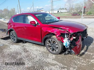 2023 Mazda CX-5 2.5 S Premium Plus Package with VIN JM3KFBEMXP0229561, listed as a IAAI auction lot 41967266 with 9,244 mi miles. Bid and sale history available at carsss.com. Image 1.