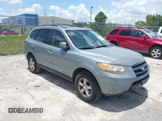 2007 Hyundai Santa Fe GLS z VIN 5NMSG13DX7H054182, wystawiony jako IAAI lot #42472138 z przebiegiem 235 905 mil mil oraz . Historia ofert i sprzedaży dostępna na DreamBid. Obrazek 1.