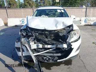 2012 Mazda CX-9 Touring z VIN JM3TB3CVXC0338761, wystawiony jako IAAI lot #42386603 z przebiegiem 166 217 mil mil oraz . Historia ofert i sprzedaży dostępna na DreamBid. Obrazek 6.