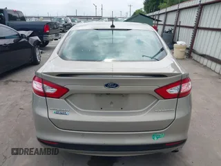 2015 Ford Fusion Energi Titanium with VIN 3FA6P0SU3FR114739, listed as a IAAI auction lot 42003011 with 120,553 mi miles. Bid and sale history available at carsss.com. Image 16.