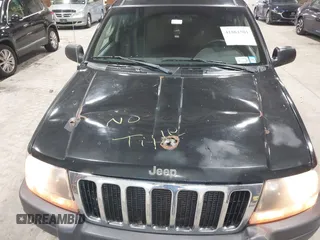 2003 Jeep Grand Cherokee Laredo with VIN 1J4GW48S63C552366, listed as a IAAI auction lot 41861501 with 227,464 mi miles. Bid and sale history available at carsss.com. Image 6.