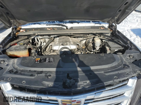 2015 Cadillac Escalade ESV Platinum z VIN 1GYS4UKJ1FR565785, wystawiony jako Copart lot #41651755 z przebiegiem 165 197 mil mil oraz Szkoda całkowita • Salvage title. Historia ofert i sprzedaży dostępna na DreamBid. Obrazek 12.